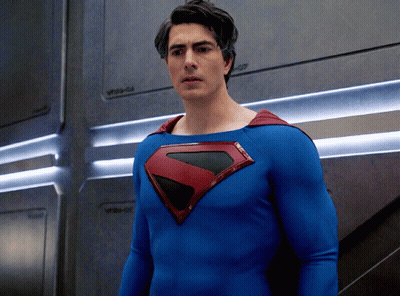 Man In Superman Costume In Front Of WB-047 GIF