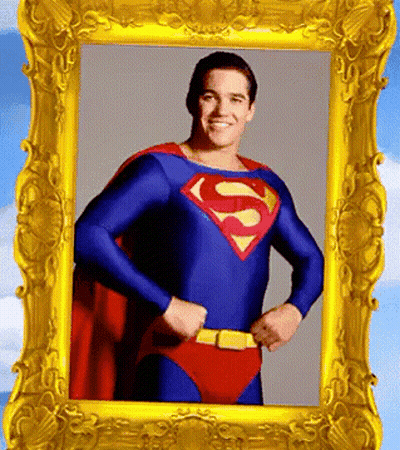 Man In Superman Costume In Gold Frame GIF