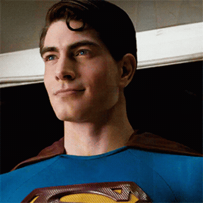 Man In Superman Costume Smiling GIF