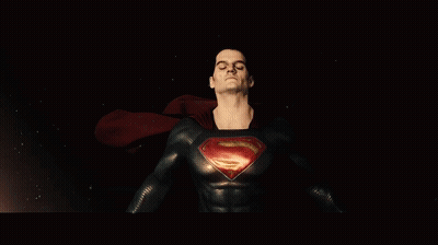 Man In Superman Costume With Glowing Eyes GIF