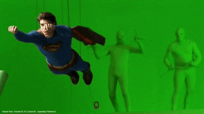 Man In Superman Suit Flying GIF