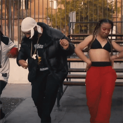 Man In Supreme Jacket Dancing With Woman GIF