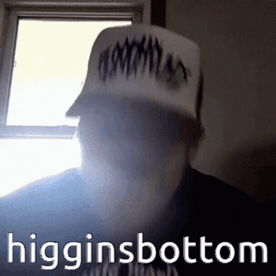 Man In Surgical Cap Pointing At Woman In Car GIF