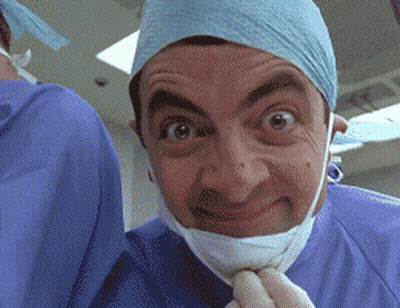 Man In Surgical Mask And Gloves Making Face GIF