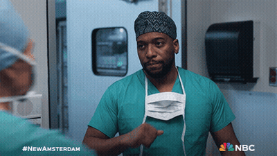 Man In Surgical Mask With NBC Logo GIF