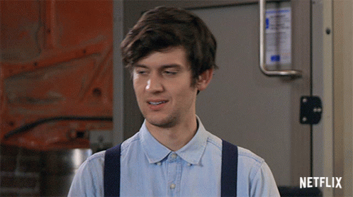 Man In Suspenders And Blue Shirt With Word Netflix GIF
