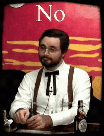 Man In Suspenders And Bow Tie Saying No GIF