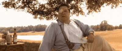 Man In Suspenders Sunglasses With Beer In Field GIF