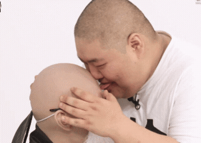 Man In Suzuki Hat Talking To Group GIF