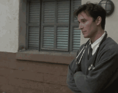 Man In Sweater And Tie With Stethoscope Arms Crossed GIF