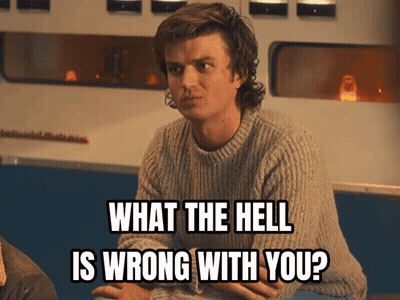 Man In Sweater Says What The Hell GIF