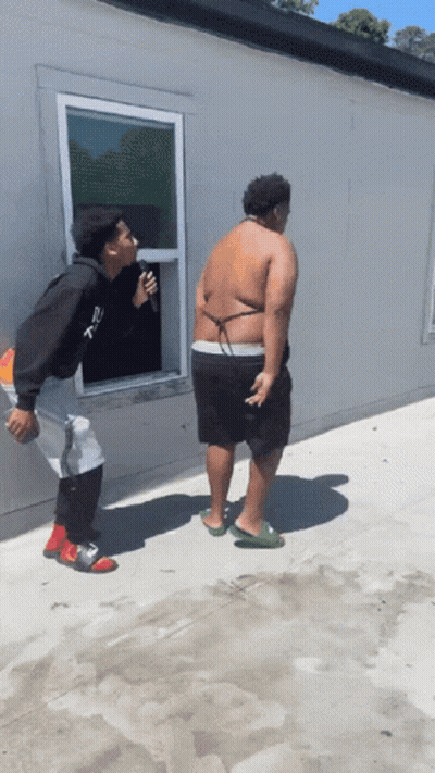 Man In Sweatshirt Saying Run GIF
