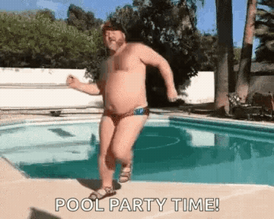 Man In Swim Trunks Dancing In Pool GIF