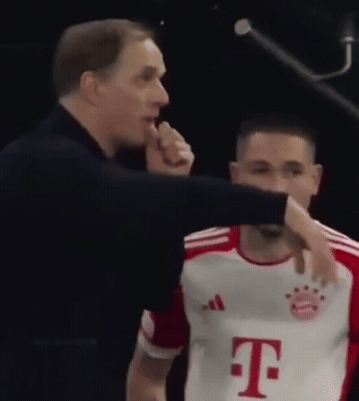 Man In T-Mobile Jersey Talking To Another Man GIF