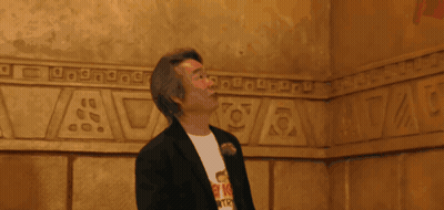 Man In T-Shirt Looking Up GIF