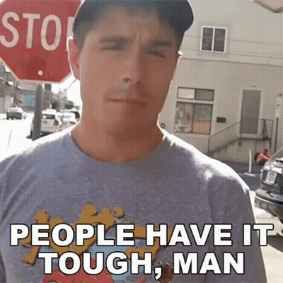Man In T-Shirt Saying People Have It Tough GIF