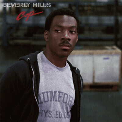 Man In T-Shirt Saying Triumph GIF