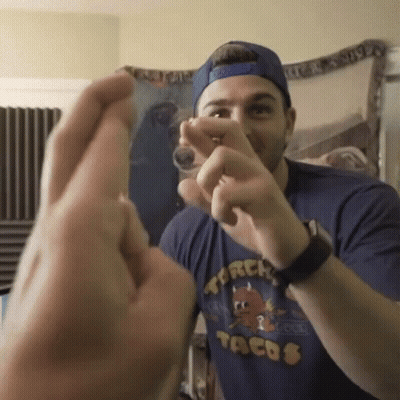 Man In Tacos Shirt Making Heart GIF