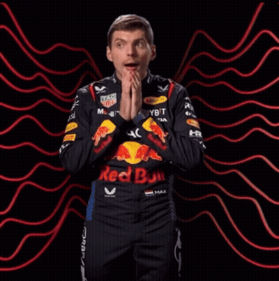 Man In Tag Heuer Jacket With Red Bull GIF