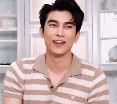 Man In Tan And White Striped Shirt With Bee GIF