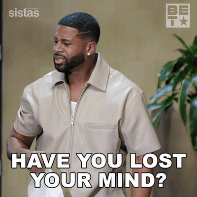 Man In Tan Jacket Asking If He Has Lost His Mind GIF