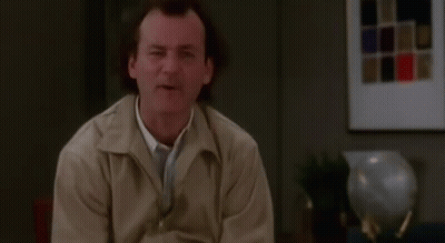 Man In Tan Jacket Making Funny Face GIF