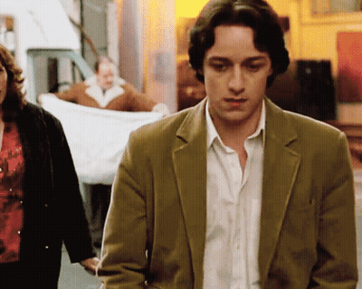 Man In Tan Jacket Walking GIF