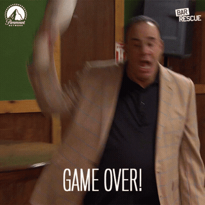 Man In Tan Suit Saying Game Over GIF