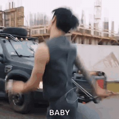Man In Tank Top Dancing Next To Car GIF