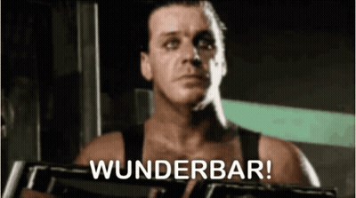 Man In Tank Top Holding Gun Says Wunderbar GIF