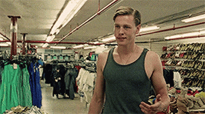 Man In Tank Top In Clothing Store GIF