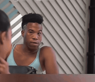 Man In Tank Top Looking In Mirror GIF