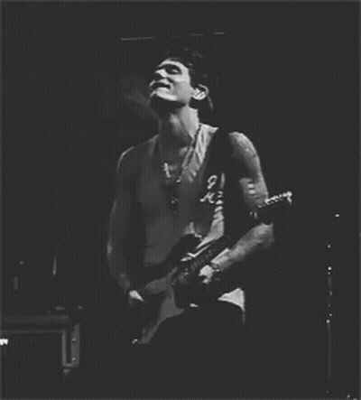 Man In Tank Top Playing Guitar GIF