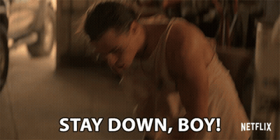 Man In Tank Top Says Stay Down Boy Netflix GIF