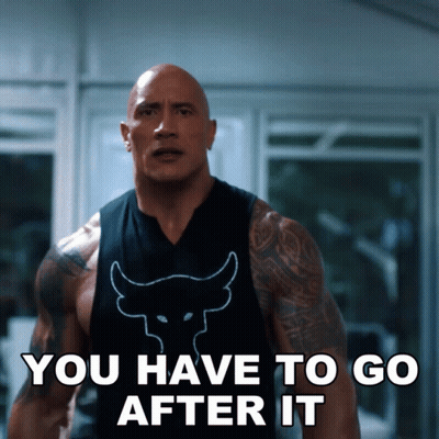 Man In Tank Top With Bull Says You Have To Go After It GIF