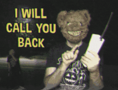 Man In Teddy Bear Mask And Samhain Shirt Holding Knife GIF