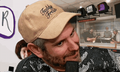 Man In Teddy Fresh Hat Looking At Camera GIF