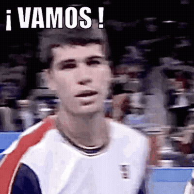 Man In Tennis Uniform Making Funny Face In Crowd GIF