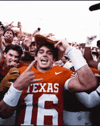 Man in Texas 16 Jersey in Front of Crowd