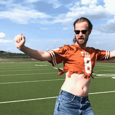 Man In Texas Jersey On Football Field GIF