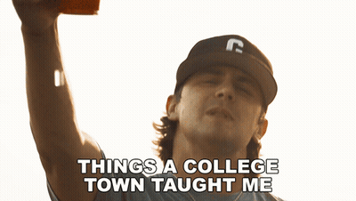 Man In Texas Tech Shirt Holding Cup GIF