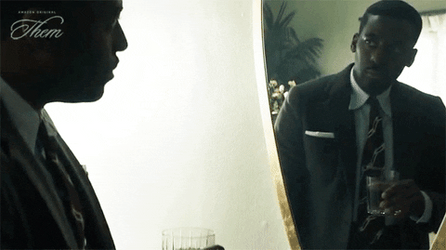 Man In The Mirror Drinking From Glass GIF