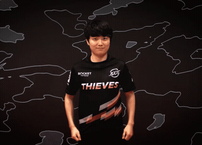 Man In Thieves Shirt Flexing Muscles GIF