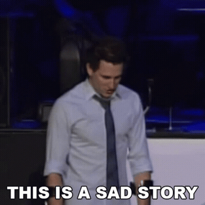 Man In Tie And Sign This Is A Sad Story GIF