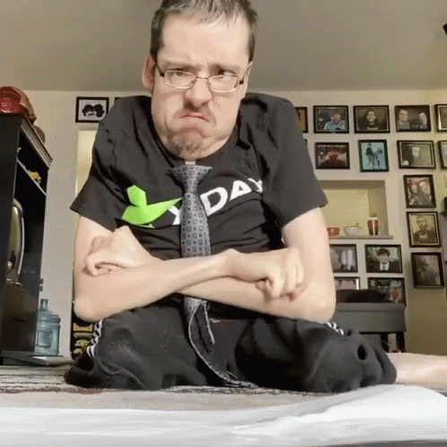 Man In Tie And Y Day Shirt GIF