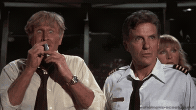 Man In Tie Holding Lighter GIF