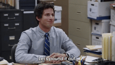 Man In Tie Saying Let's Pound It Out GIF