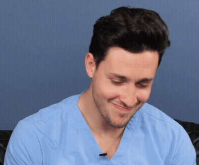 Man In Tie Sitting And Crying GIF