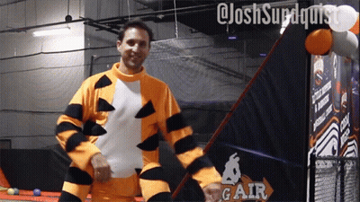 Man In Tigger Costume With Gar Sign GIF