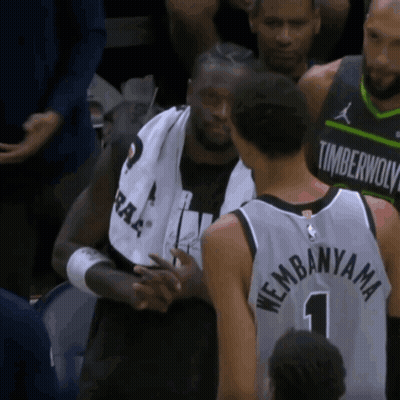 Man In Timberwolves Jersey Shaking Hands GIF